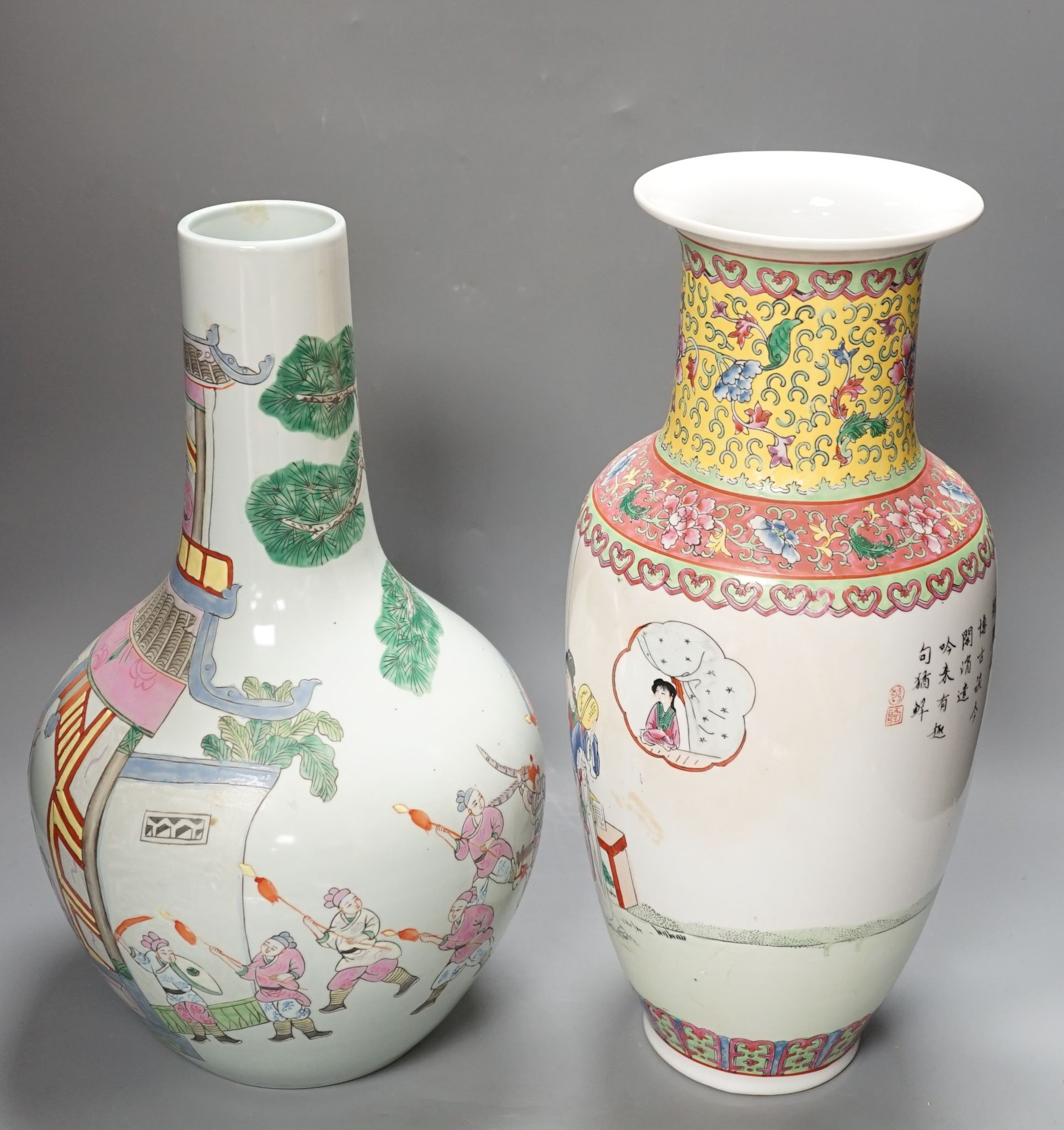 Two Chinese famille rose vases, tallest 42 cms high.